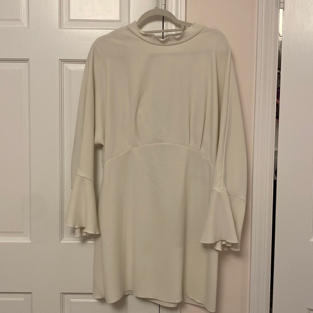 Short ivory dress, open back